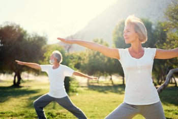 A wellness-minded couple exercising.