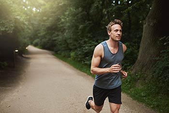 A wellness-minded man jogging.